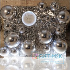 Фотозона из серебряных пайеток и сфер на Новый год